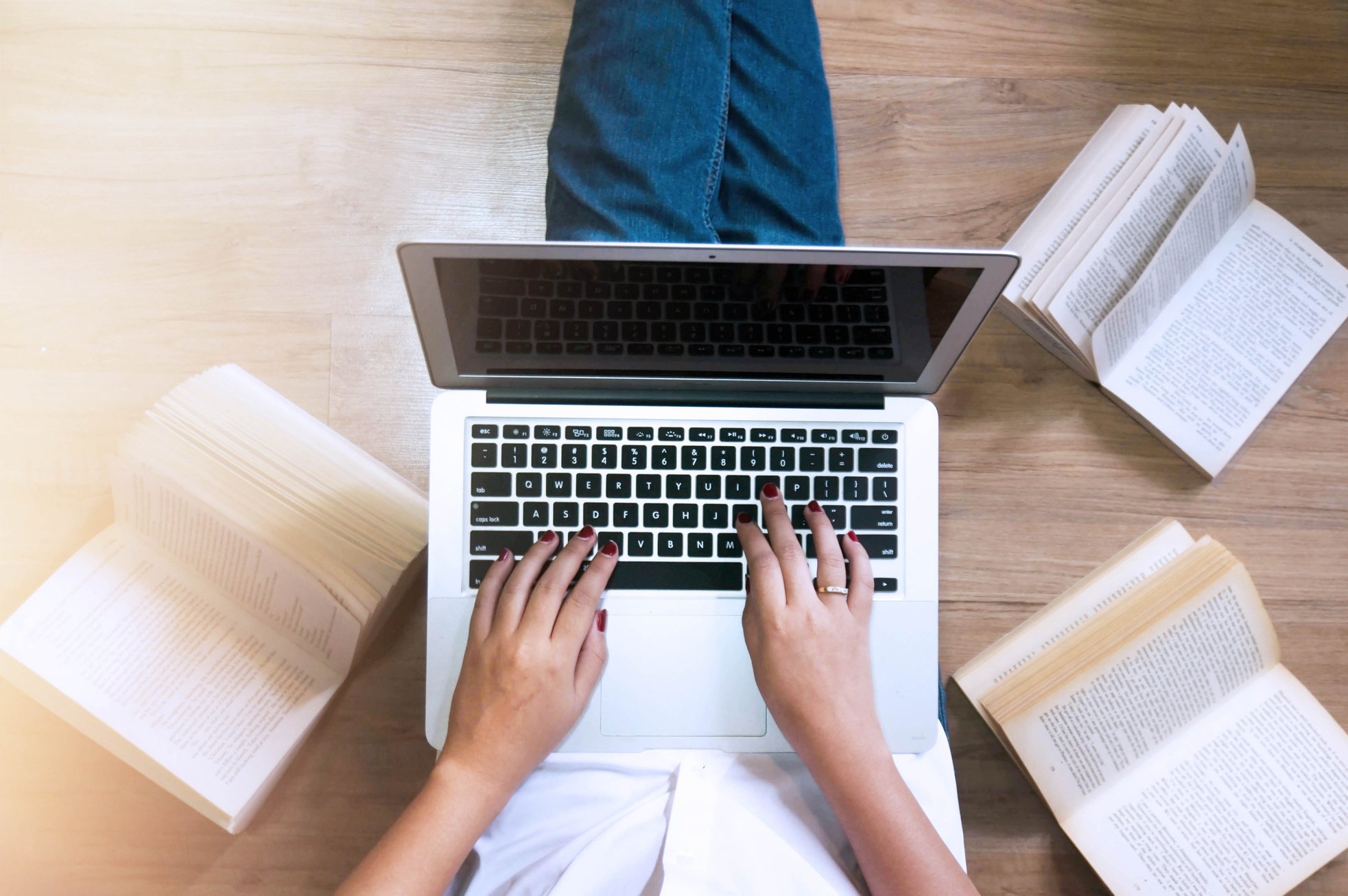 Top View Girl Sitting on the Floor and Working with Laptop or No